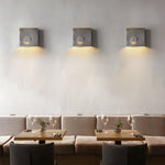 Eclipse Frosted Cement LED Wall Sconce for Modern Interiors