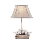 French Perched Bird Table Lamp on Stacked Books, Beige Fabric Shade