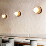 Elira Wall Sconce in Yellow Travertine with Opal Glass Shade