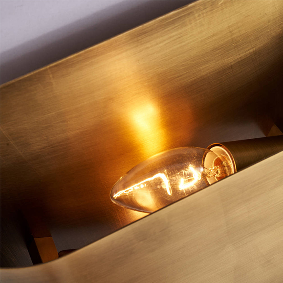 Modern Brass Up and Down Wall Sconce for Refined Interiors