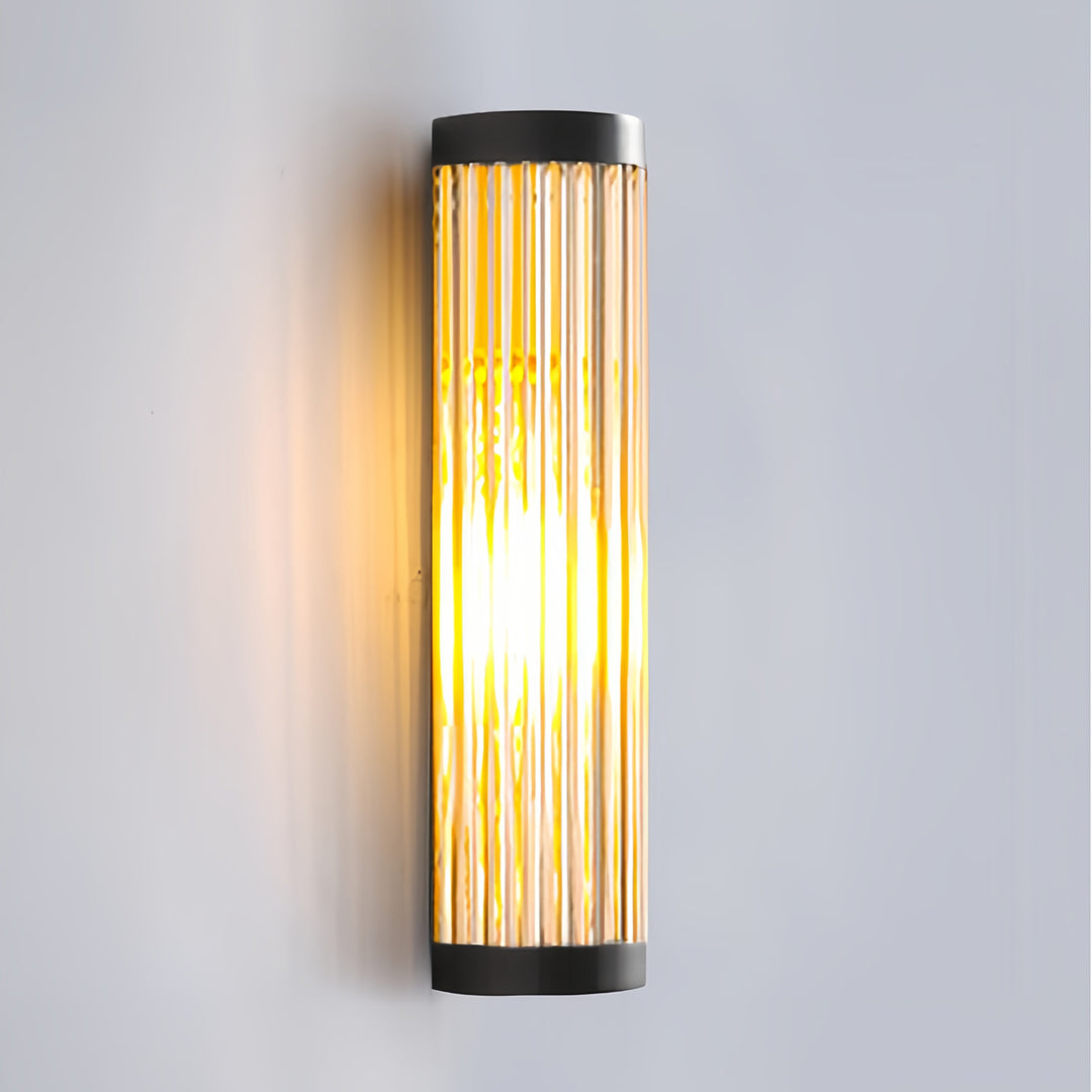 Cylinder Outdoor Wall Sconce in Stainless Steel with Warm LED Glow