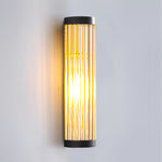 Cylinder Outdoor Wall Sconce in Stainless Steel with Warm LED Glow