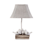 French Perched Bird Table Lamp on Stacked Books, Beige Fabric Shade