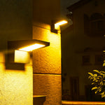 Aria Solar Wall Sconce — Modern Outdoor Lighting in Black Aluminum