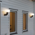 Arc Outdoor Wall Sconce in Black Stainless Steel with Warm LED Glow