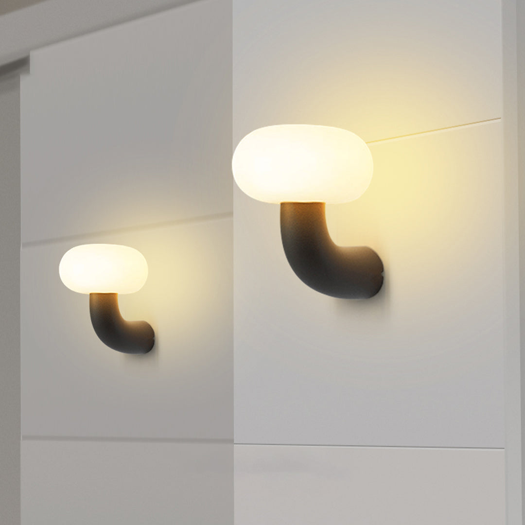 Arc Outdoor Wall Sconce in Black Stainless Steel with Warm LED Glow