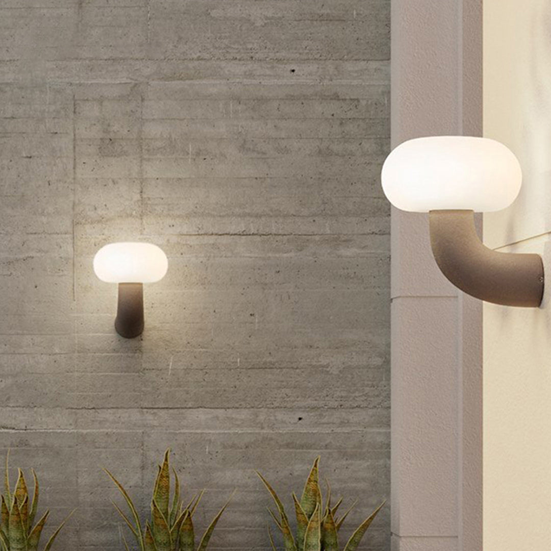 Arc Outdoor Wall Sconce in Black Stainless Steel with Warm LED Glow