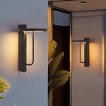 Aria Outdoor Wall Sconce in Black Stainless Steel with Warm LED Glow
