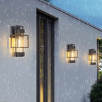 Vintage Wrought Iron Outdoor Wall Sconce with Clear Glass Shade