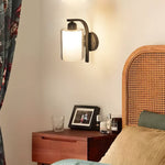 Cylindrical Glass Wall Sconce in Matte Black for Modern Interiors