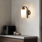 Cylindrical Glass Wall Sconce in Matte Black for Modern Interiors