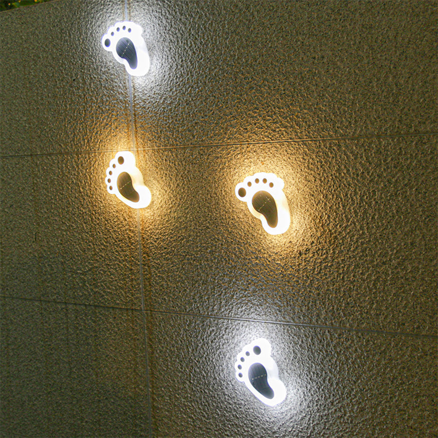 Solar-Powered Path Lights with Sculptural Footprint Design for Modern Gardens