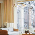 Solara LED Chandelier in Brass and Glass for Modern Interiors