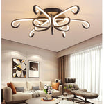 Modern Artistic Octopus Inspired Flush Mount Ceiling Light With Sleek Curved Led Design