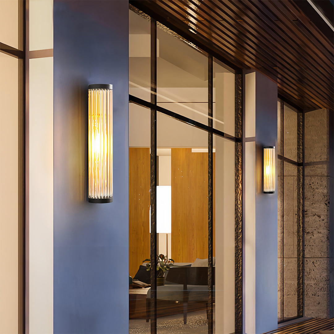 Cylinder Outdoor Wall Sconce in Stainless Steel with Warm LED Glow