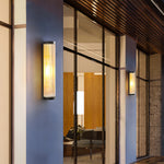 Cylinder Outdoor Wall Sconce in Stainless Steel with Warm LED Glow