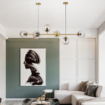 Aurora Linear Glass Globe Chandelier in Gold for Modern Dining Rooms