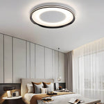 Round LED Flush Ceiling Light in Matte Black with Layered Halo Illumination