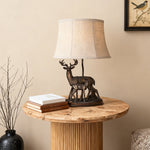Sculpted Deer Table Lamp with Bronze Finish and Beige Linen Shade
