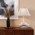 French Perched Bird Table Lamp on Stacked Books, Beige Fabric Shade