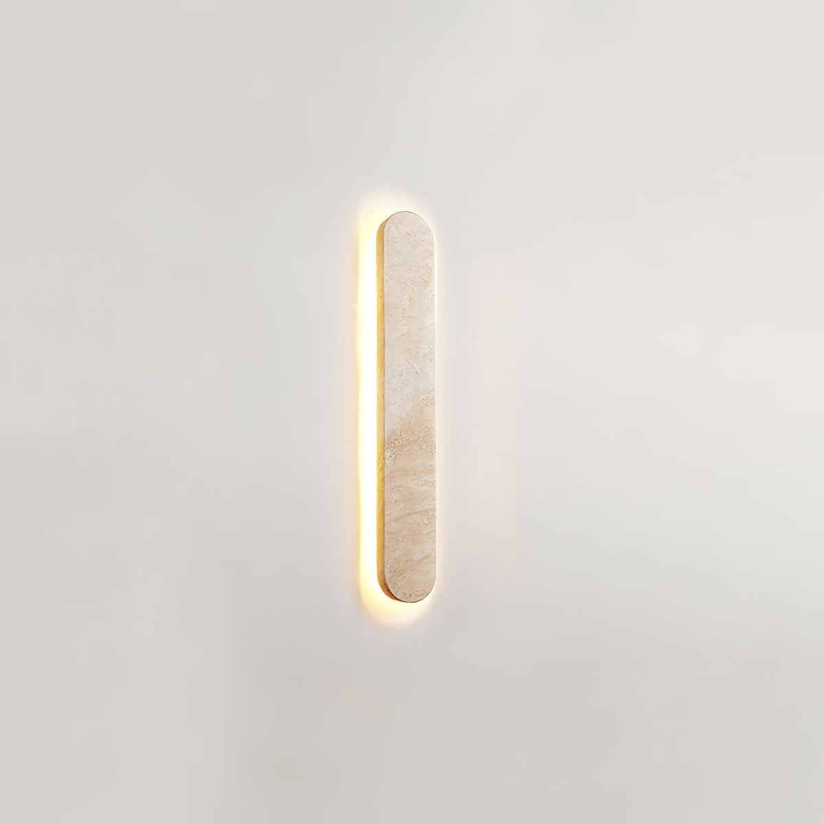 Lior Sculptural Travertine LED Wall Sconce for Modern Interiors