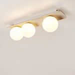 Orélie Modern Travertine Ceiling Light with Frosted Glass Globes