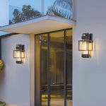Vintage Wrought Iron Outdoor Wall Sconce with Clear Glass Shade