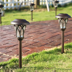 Retro Modern Solar LED Stake Lights in Glass and Stainless Steel for Pathways and Gardens
