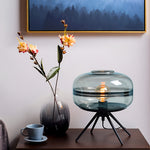 Nordic Glass Table Lamp with Four-Legged Iron Base for Modern Interiors
