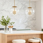 Lumina Clear Glass Globe Pendant Light in Gold