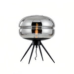Nordic Glass Table Lamp with Four-Legged Iron Base for Modern Interiors