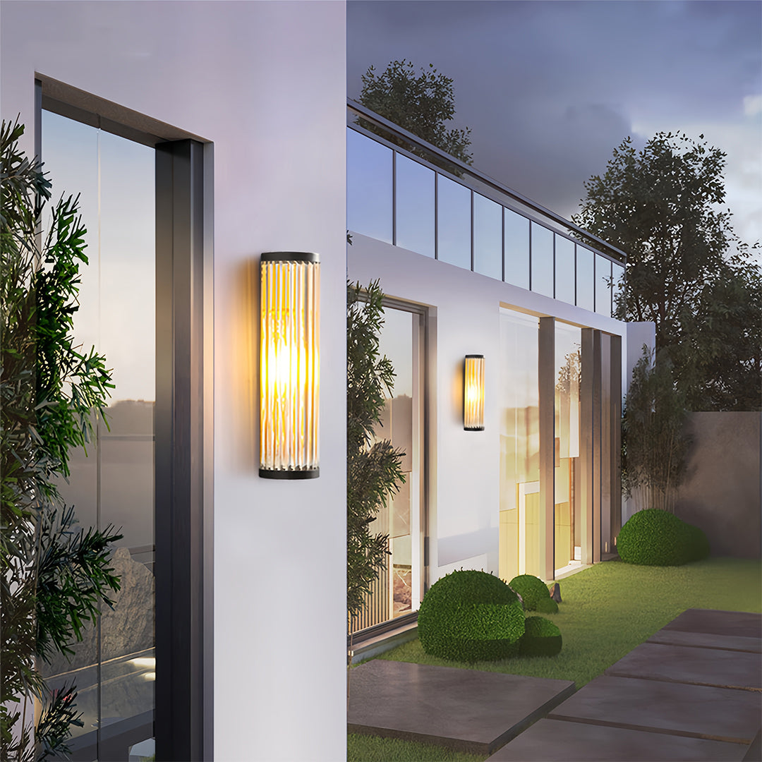 Cylinder Outdoor Wall Sconce in Stainless Steel with Warm LED Glow