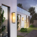Cylinder Outdoor Wall Sconce in Stainless Steel with Warm LED Glow