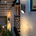 Modern Outdoor Up and Down Wall Sconce in Black Stainless Steel with Clear Glass