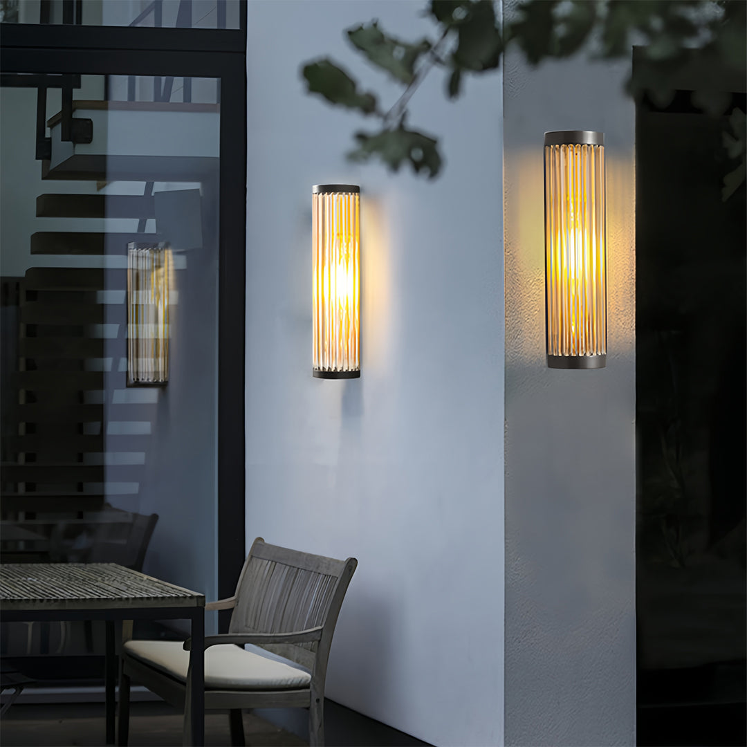 Cylinder Outdoor Wall Sconce in Stainless Steel with Warm LED Glow