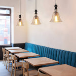 Artisan Iron and Glass Pendant Light with Warm Ambient Glow