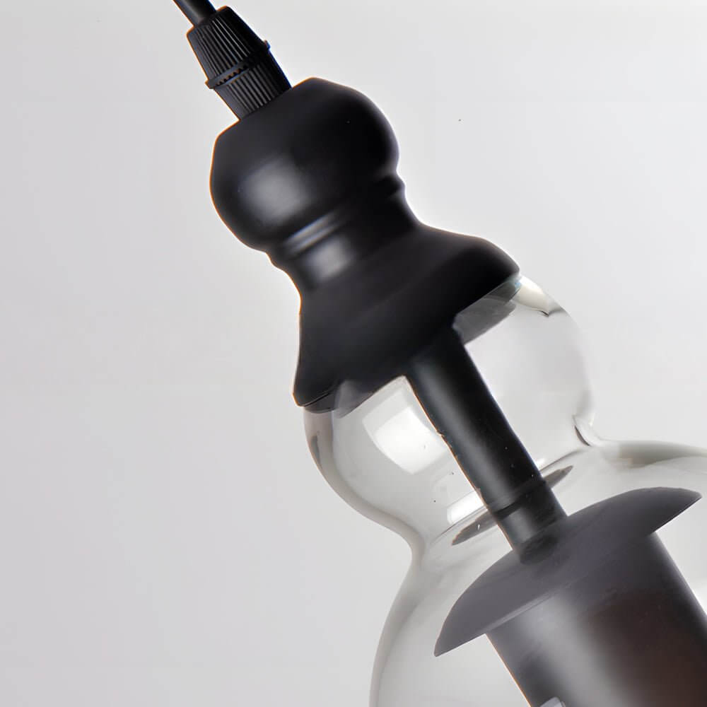 Artisan Iron and Glass Pendant Light with Warm Ambient Glow