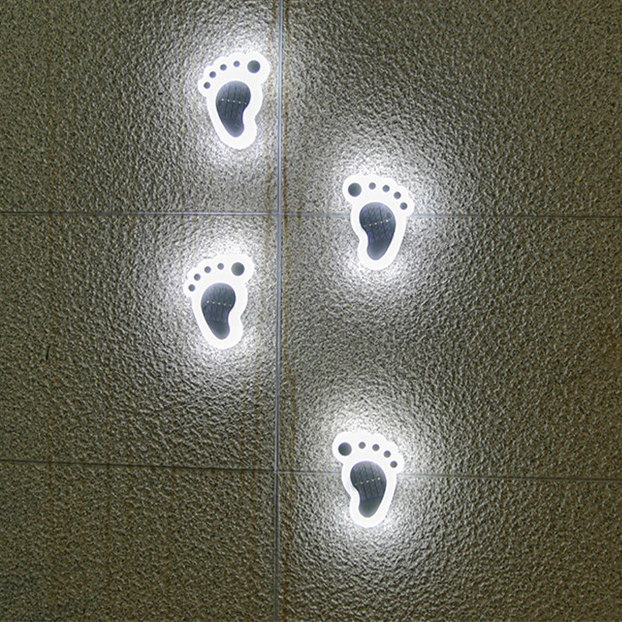 Solar-Powered Path Lights with Sculptural Footprint Design for Modern Gardens